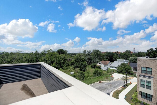 Building Photo - Luxury 4-Story Townhome with Rooftop Terrace!