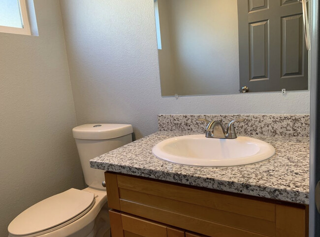 Granite and tile 1/2 bathroom downstr - 8651 Santa Paula Way