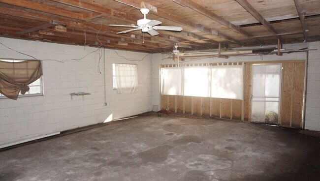 Building Photo - Four Bed - Three Bath - Large Storage Area...