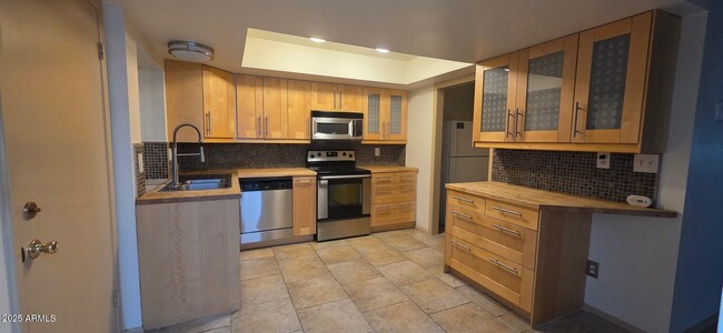 Building Photo - 7744 E Camelback Rd