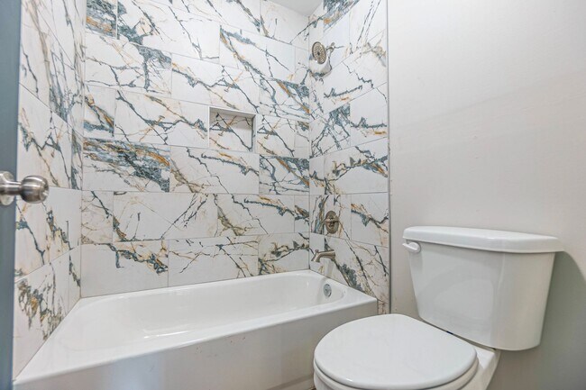 Building Photo - Spacious Four-Bedroom Two-Bath Home on One...