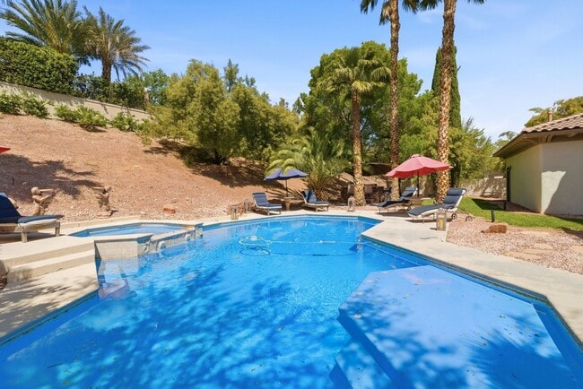 Building Photo - Private Gated Christopher Homes Estate in The Vineyards | Resort-Style Backyard & Strip Views