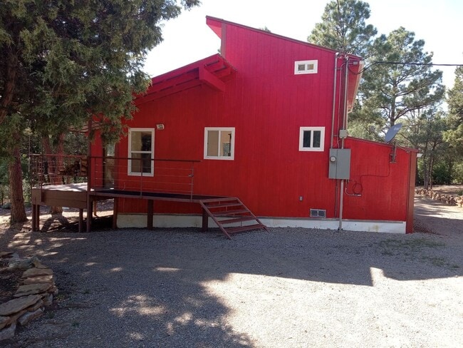 Building Photo - COZY HOME IN THE BEAUTIFUL TOWN OF TIJERAS | Showings available NOW!!