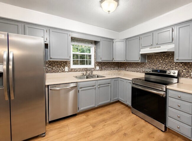 Building Photo - 11104 Hughlan Dr