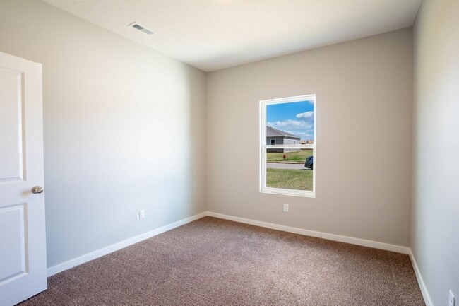 Building Photo - BRAND NEW 3 BEDROOM HOME WITH 3 CAR GARAGE