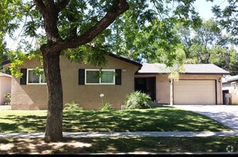 Building Photo - Updated home featuring a nice floor plan a...