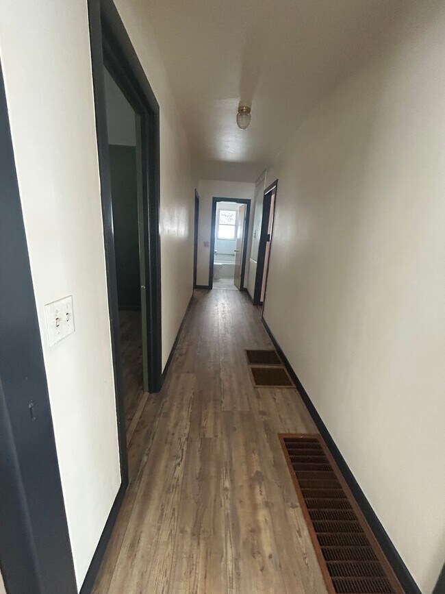 Building Photo - Bigfork Rodeo Farmhouse~ Fenced garden, greenhouse, garage, barn and shop!