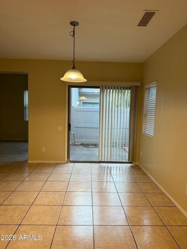 Building Photo - 8460 W Lewis Ave