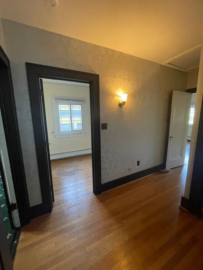 Building Photo - One Block to the Diag! Charming Home with Private Courtyard + Parking