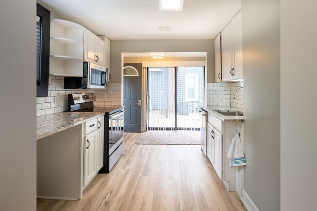 Kitchen looking out to deck. - 222 6th Ave SE