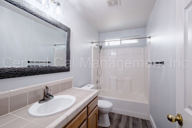 Building Photo - 3 Bedroom/2 Bath with a Pool and Solar - $...