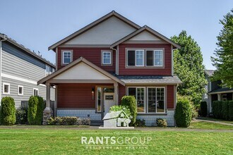 Building Photo - Fantastic Puyallup Neighborhood! Easy Comm...