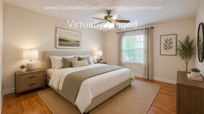 Building Photo - MOVE IN READY! LARGE 2 BEDROOM/2 BATH PLUS ATTACHED GARAGE! TILE/LVP THROUGHOUT!