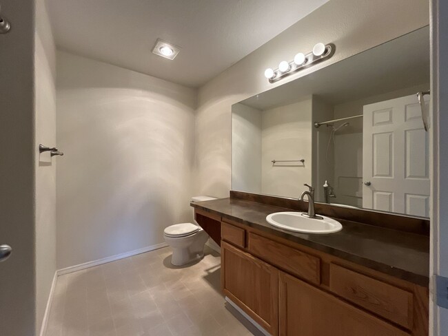 Building Photo - Spacious Three-Story Townhome Near Orenco Station with Attached Garage, Private Balcony, and Vaul...