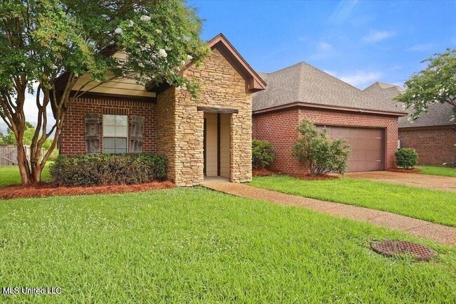 Building Photo - 409 Sand Stone Pl