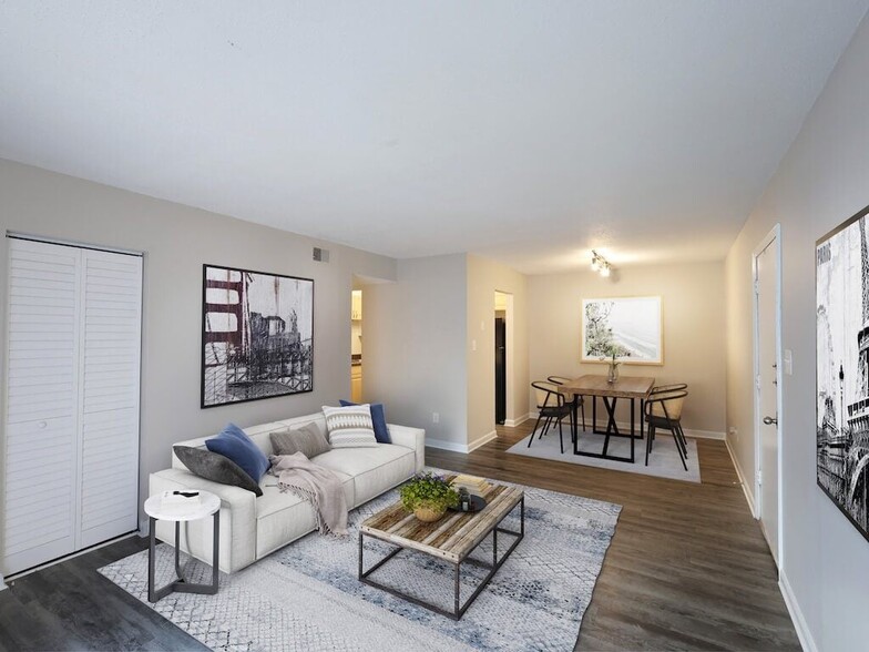 Living Room with Hardwood Style Flooring - Colony Village