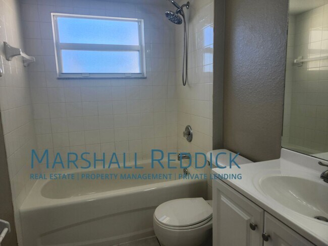 Building Photo - 3 BED 2 BATH SINGLE FAMILY HOME ON FRESH WATER CANAL WITH DOCK
