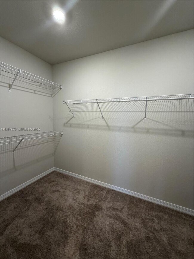 Building Photo - 12251 SW Periwinkle Ct