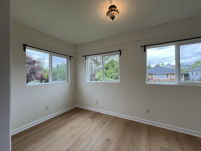 Building Photo - Character-Filled Concordia Home with Flexible Living Spaces & Gas Fireplace