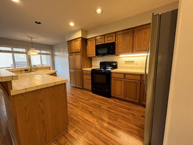 Building Photo - Elegant Home Offering Open Living Spaces, Spacious Primary Suite, and Nature-Inspired Yard