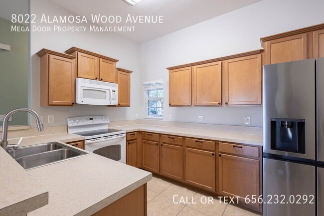 Building Photo - 8022 Alamosa Wood Ave