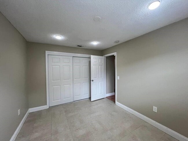 Building Photo - 11360 NW 37th Pl