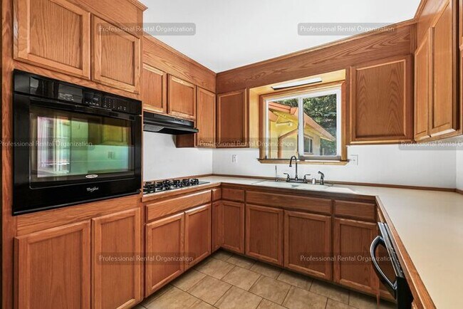 Building Photo - Look No Further, this home has it all- Hot Tub, Sauna, EV Charger, Solar, KOI Pond & More