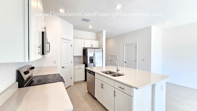 Building Photo - OUTSTANDING BRAND NEW TOWNHOME! SKYE RANCH...