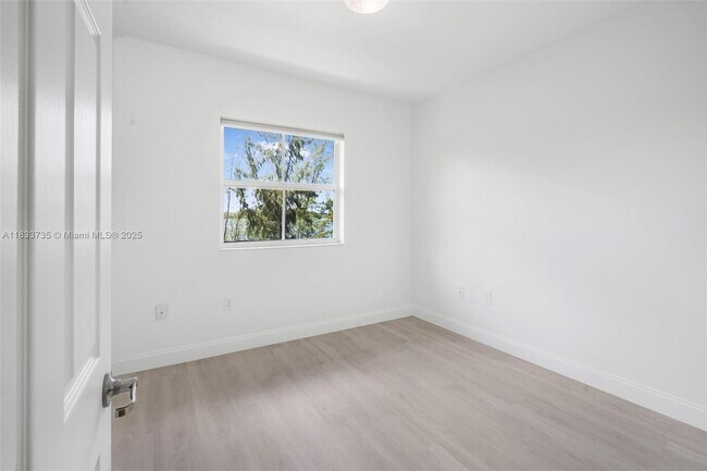Building Photo - 8650 NW 97th Ave
