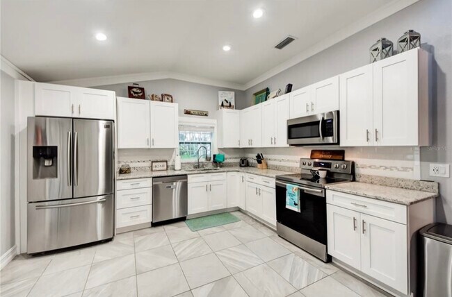 Building Photo - 8933 Bayaud Dr