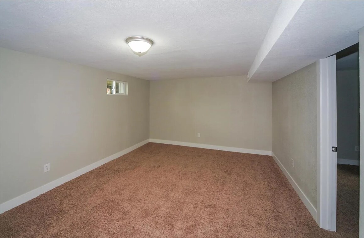 Down stairs living room - 827 S Robb Way