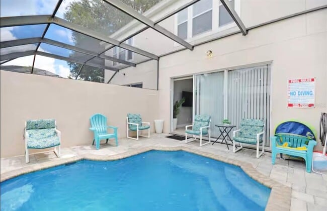 Building Photo - 8117 Princess Palm Ln