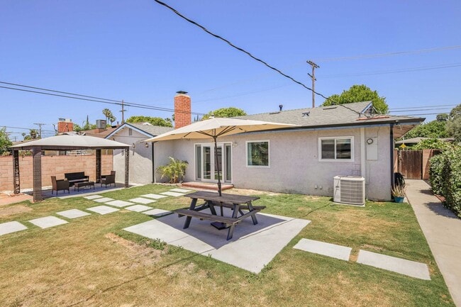 Building Photo - Stylishly Remodeled 4-Bedroom Home in Prim...