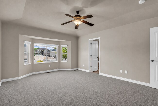 Building Photo - Spacious Syracuse Home with Covered Deck, Loft & Oversized 3-Car Garage