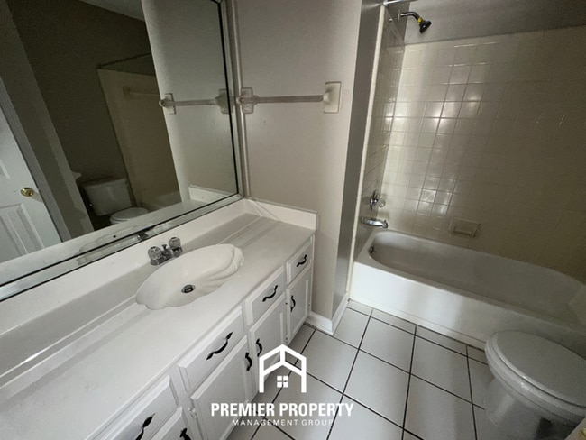 Building Photo - Charming 2BR/2.5BA Townhome | Dual Primary Suites, Fireplace & Fenced Yard