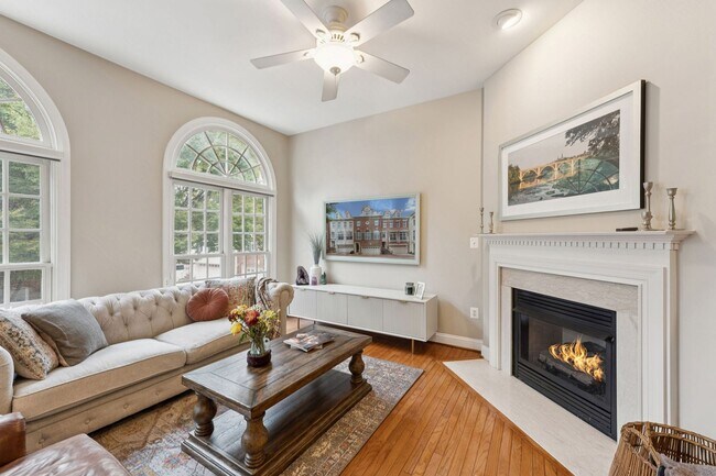 Building Photo - Discover this stunning four-level townhous...