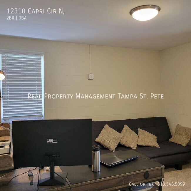 Building Photo - 12310 Capri Cir N