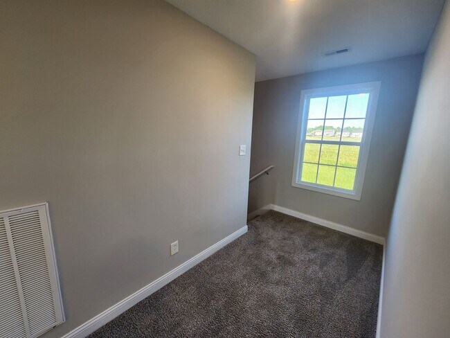Building Photo - Practically Brand New!
