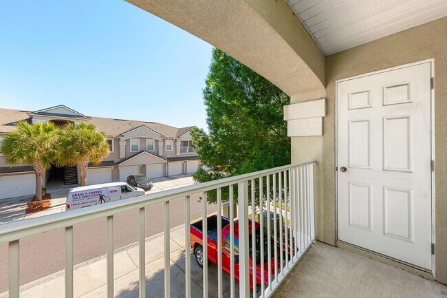 Building Photo - Beautifully Updated & Spacious 3BR/2BA Condo in a Secure Gated Community — Includes Cable, Intern...