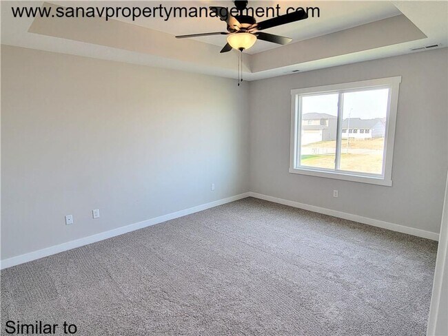 Building Photo - Spacious 4-Bedroom Home in Bondurant for R...