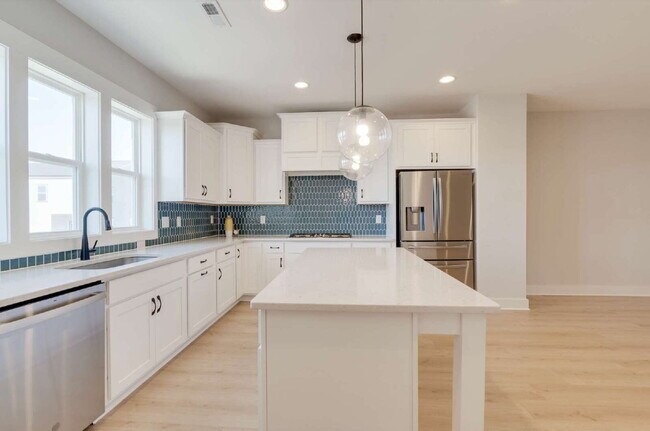 Building Photo - Spacious 4-Bedroom Townhome in Wendell Falls