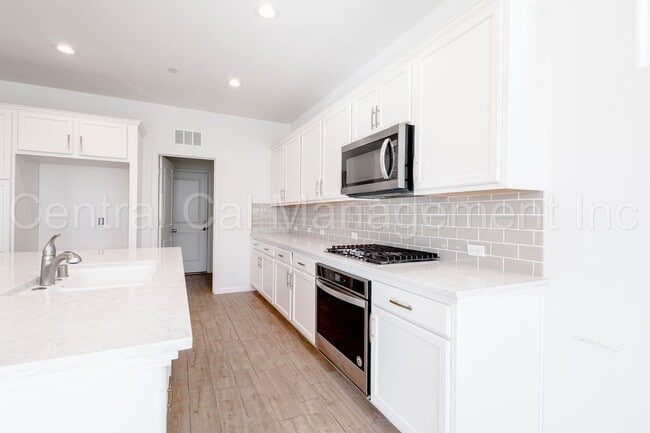 Building Photo - 4 Bedroom/2 Bath Home with Paid Solar - $2995 Per Month!