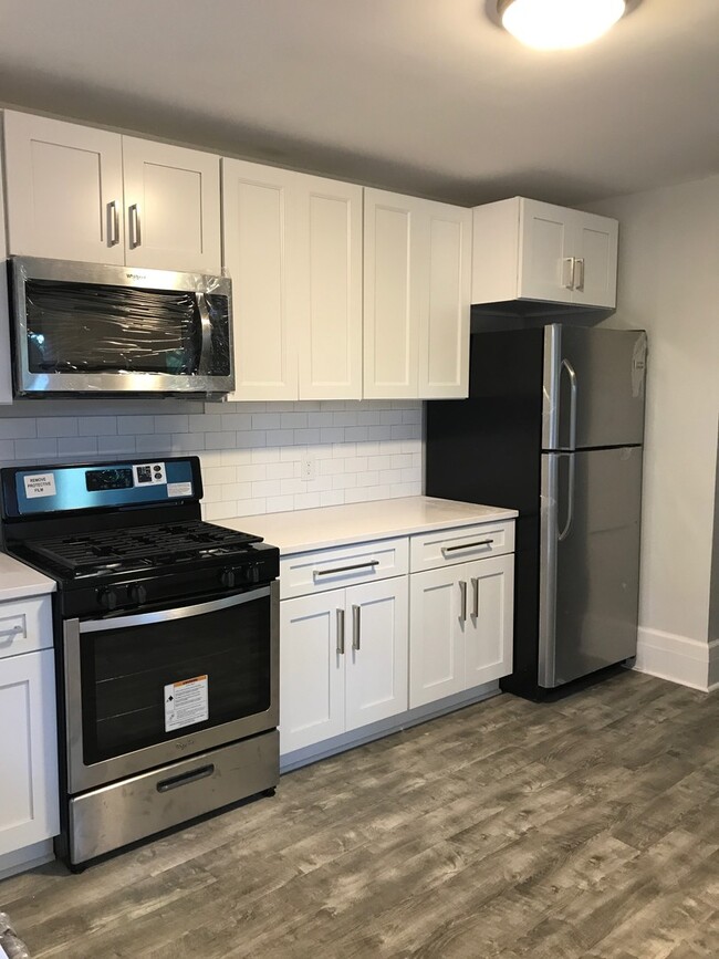 Building Photo - *GORGEOUS, completely updated single famil...