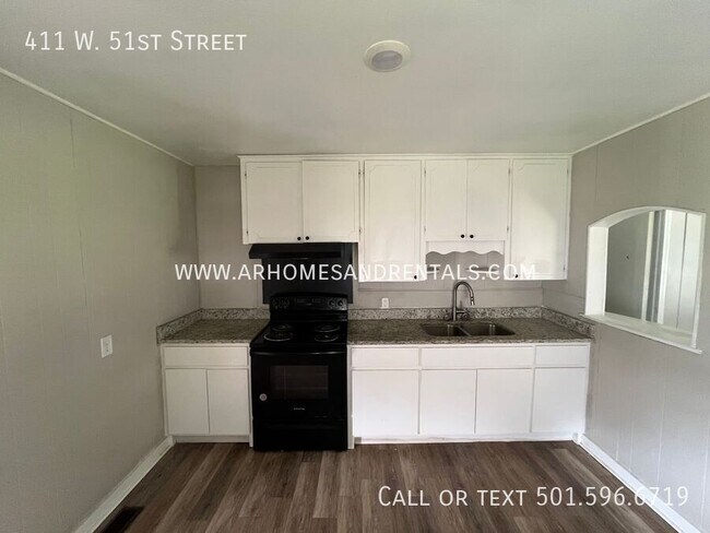 Building Photo - 411 W 51st St