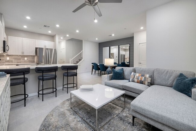 Building Photo - FULLY FURNISHED BRAND NEW TOWNHOME WITH 3 BEDROOMS + 2 CAR GARAGE