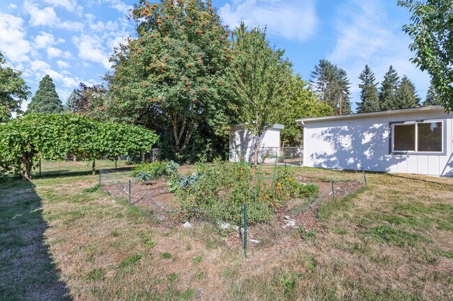 Building Photo - MOVE IN READY NOW! 2-Bedroom Rambler with Detached 900 Sq. Ft. Garage & Studio on Spacious Fenced...