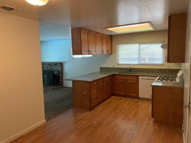 Building Photo - Enjoy the Backyard Pool at This 4-Bedroom ...