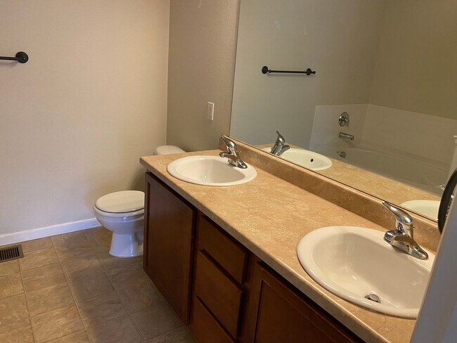 Building Photo - Large garage with attached spacious 2 bedroom townhome