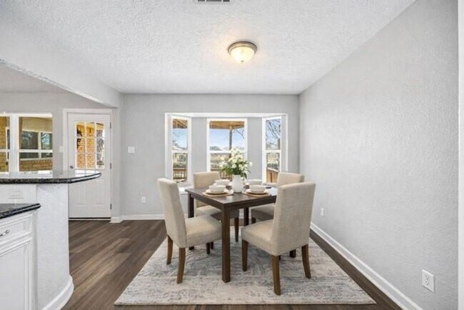 Building Photo - Welcome to this fully remodeled 4/2/2 brick home near Lake Conroe! With new AC/heat, roof, water ...