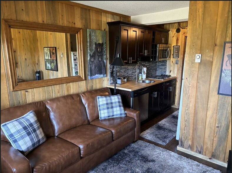 Family room and kitchen - 225 Co Rd 804